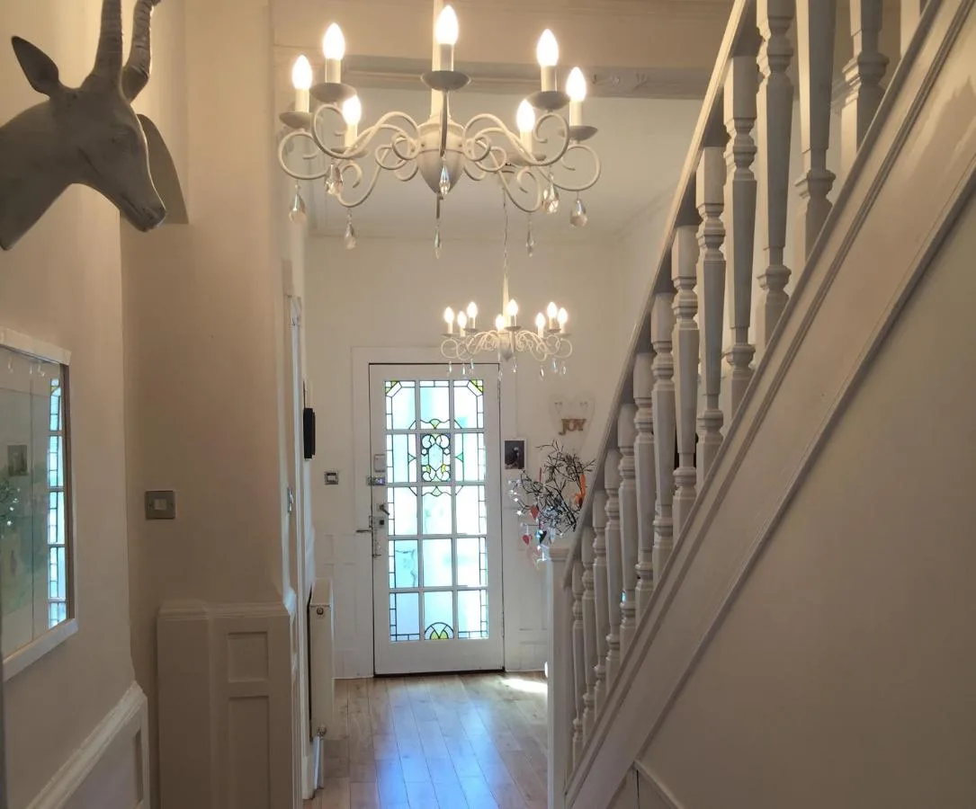 Hallway with chandelier