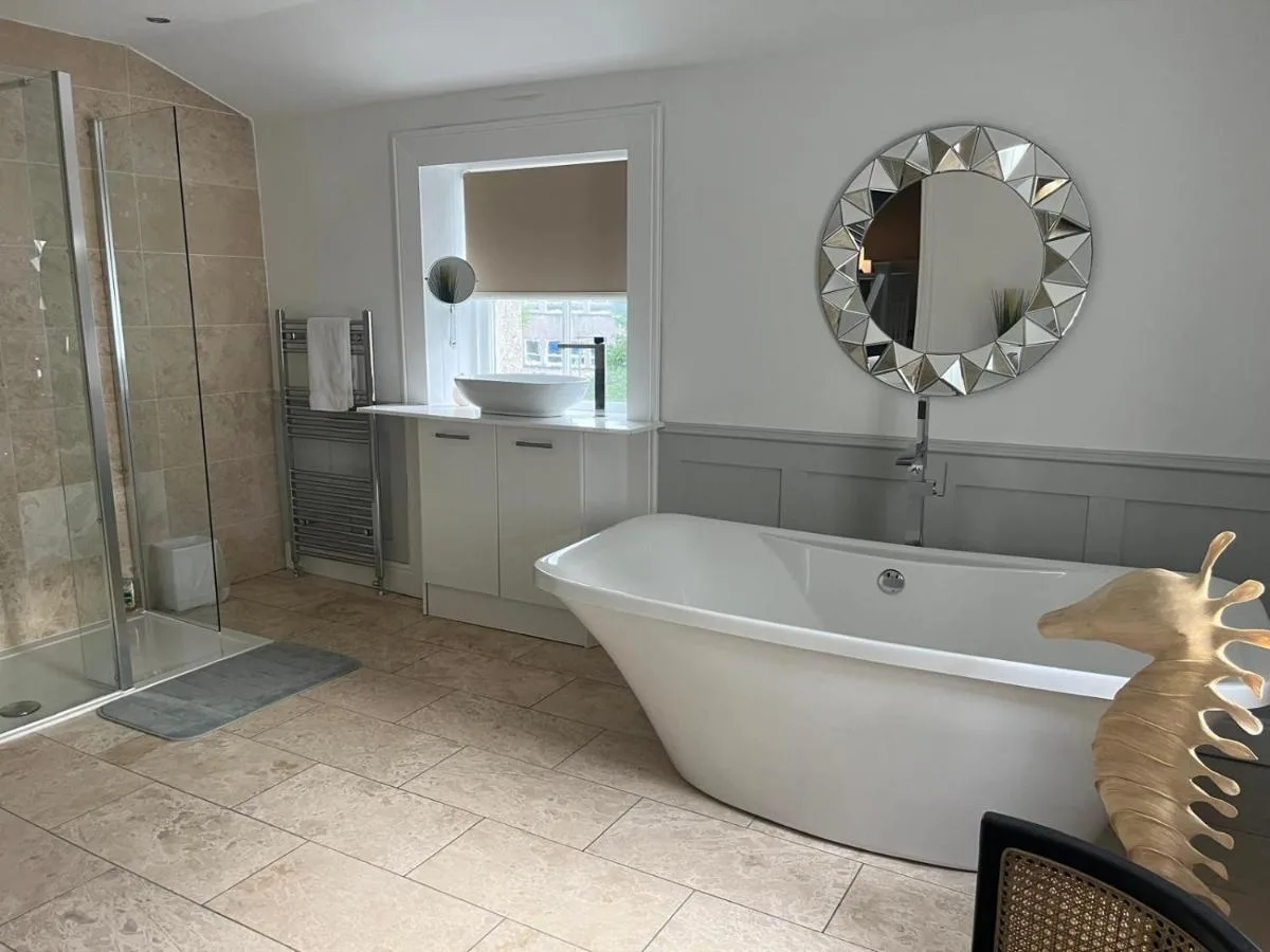 Bathroom with freestanding bath